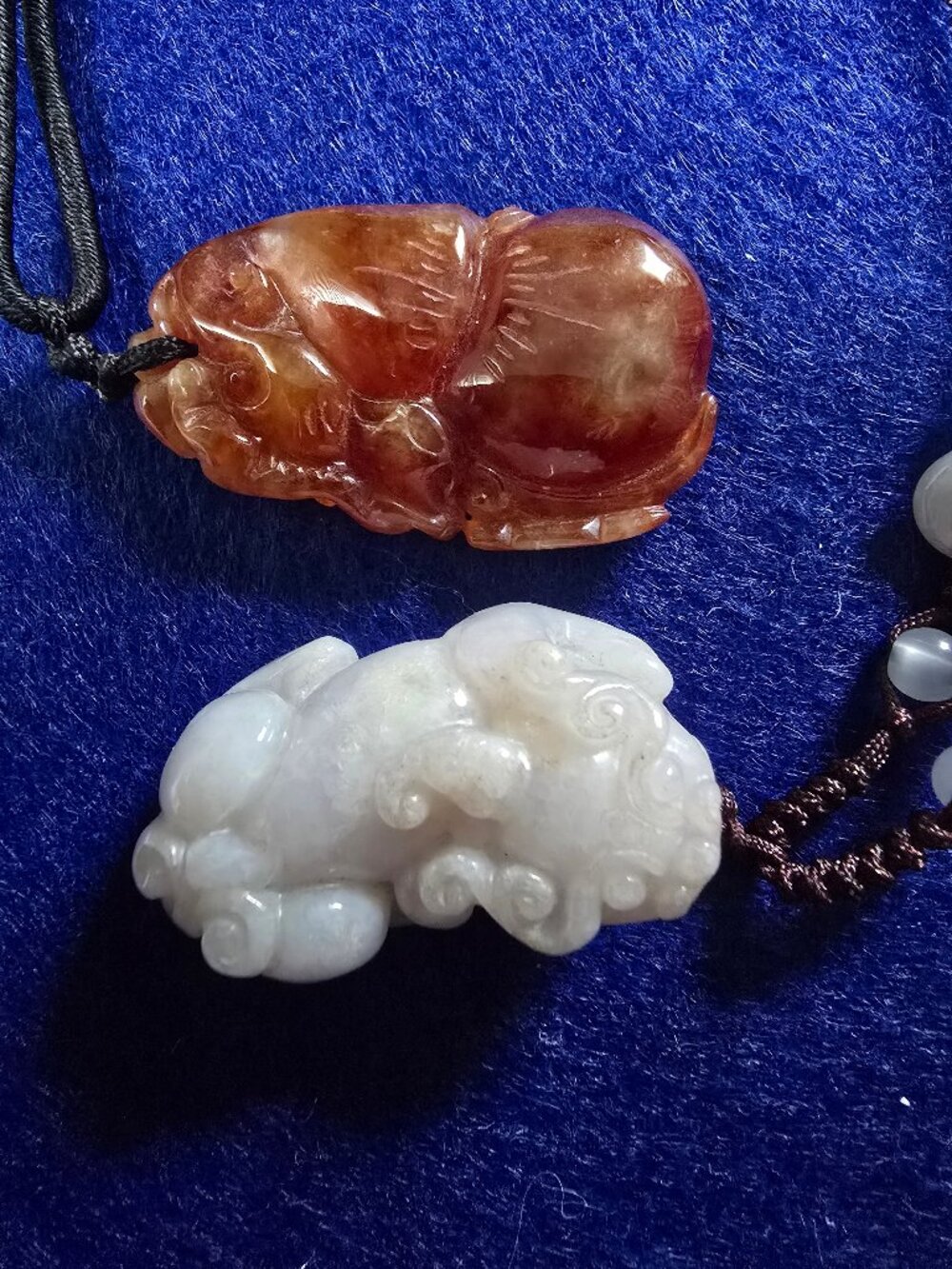 Set of Two Beautiful Carved Stone Pendants